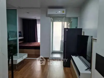Modern apartment interior with sleek design, featuring a cozy bedroom and stylish living area.