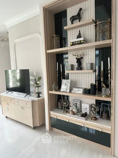 Elegant living room with modern decor and stylish shelving unit