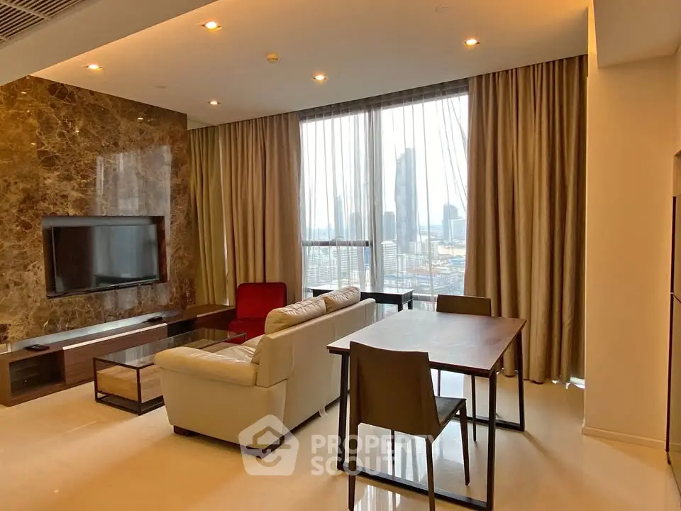 Luxurious living room with stunning city view, modern furniture, and elegant decor in high-rise apartment.
