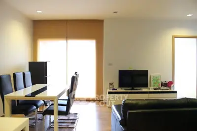 Modern living room with sleek furniture and natural light