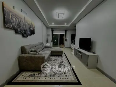 Spacious modern living room with stylish decor and comfortable seating