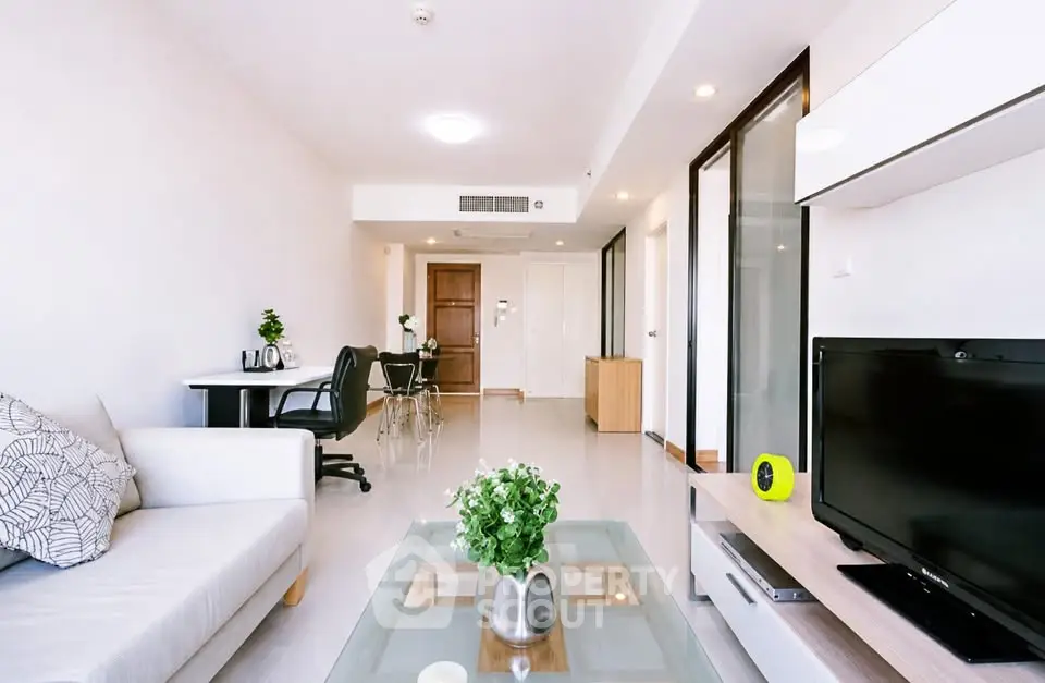 Spacious modern living room with sleek furniture and natural light