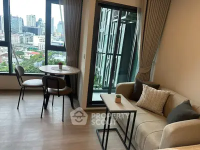 Modern living room with city view and cozy seating area