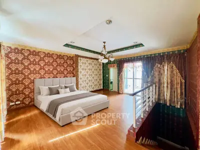 Luxurious bedroom with elegant wallpaper and stylish ceiling design, featuring a cozy bed and natural light.