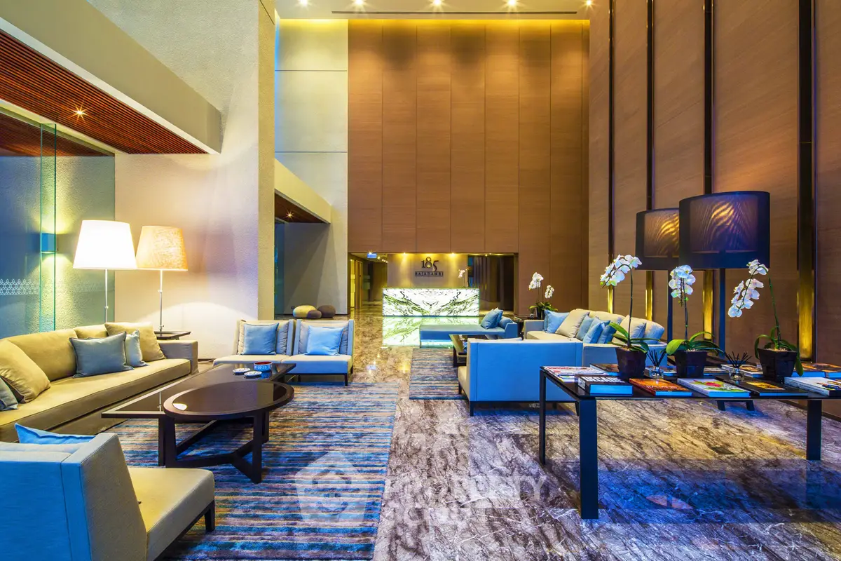 Luxurious modern living room with high ceilings and elegant decor