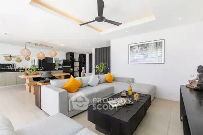 Luxurious open-plan living room with modern decor and spacious seating area.