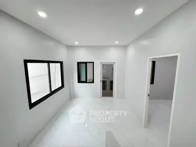 Modern minimalist room with white marble flooring and large windows