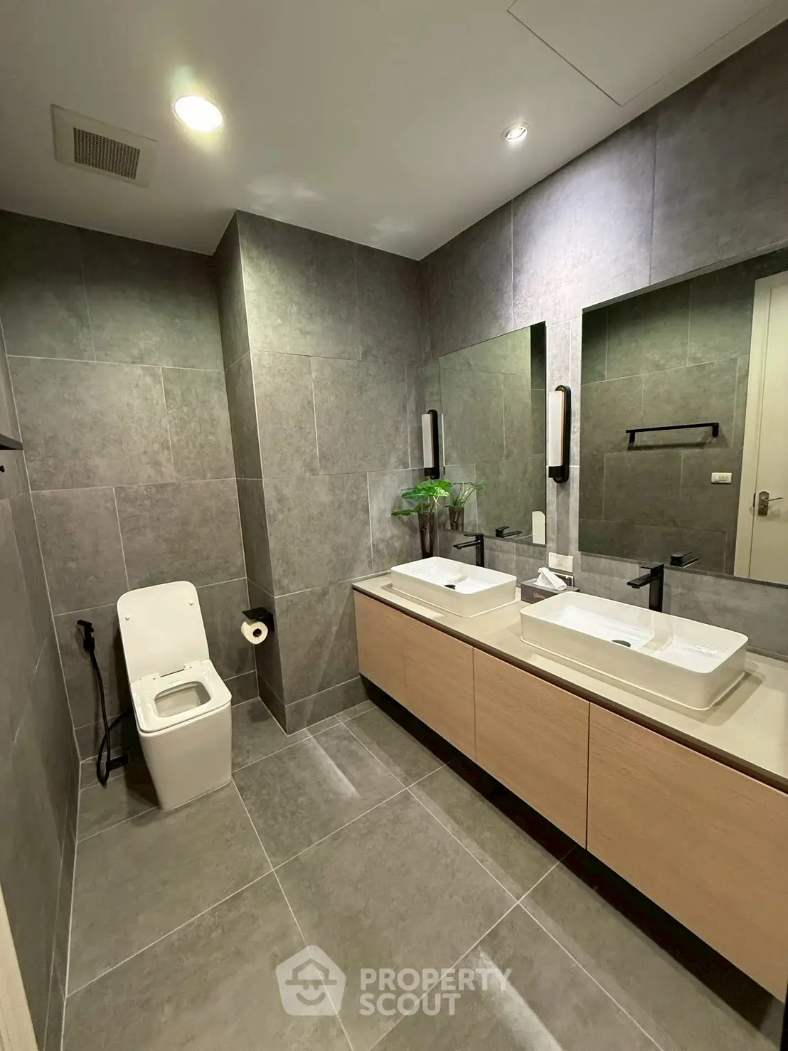 Modern bathroom with dual sinks and sleek design