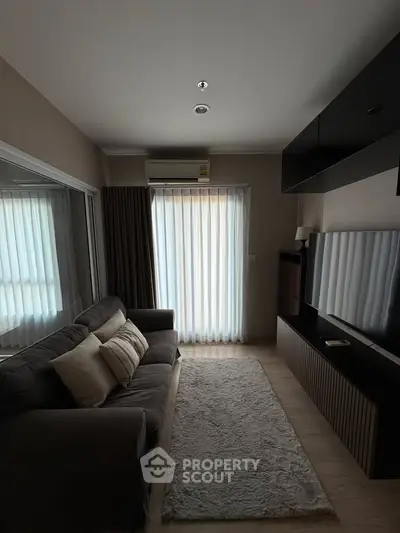 Cozy living room with modern decor and natural light