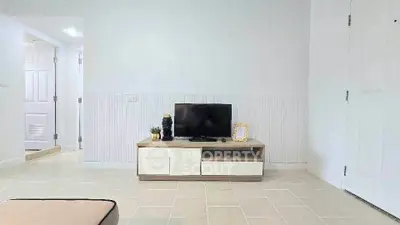 Modern living room with sleek TV stand and minimalist decor