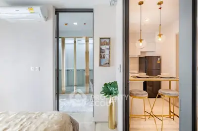 Modern apartment interior with stylish kitchen and cozy bedroom
