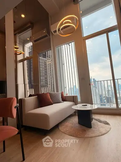 Luxurious modern living room with floor-to-ceiling windows and city skyline view.