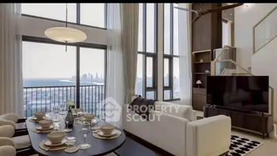 Luxurious high-rise living room with stunning city view and elegant dining area.