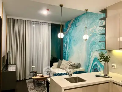 Stylish modern living room with marble countertop and artistic blue accent wall