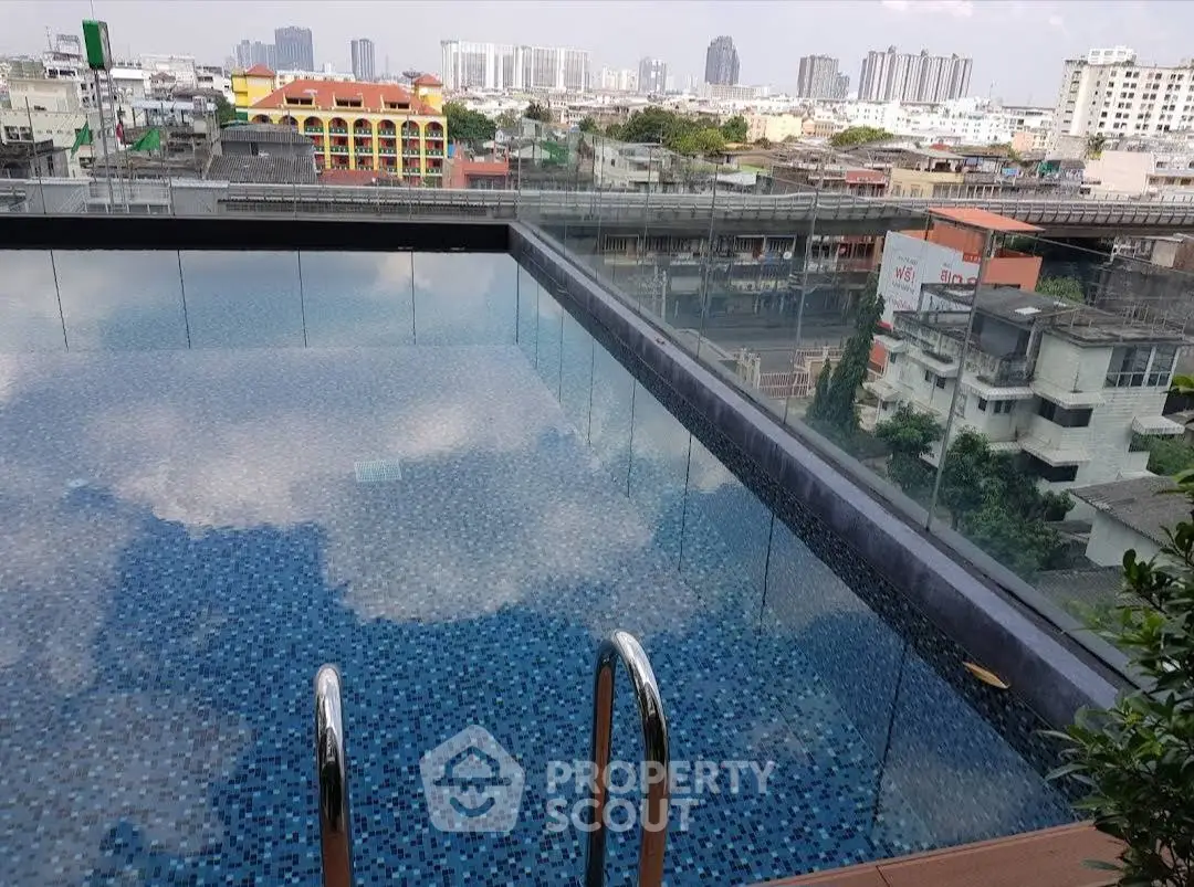 Stunning rooftop pool with panoramic city views, perfect for urban living.