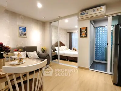 Cozy modern apartment with open layout, featuring a stylish living area and elegant bedroom.