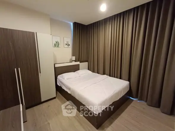 Modern bedroom with sleek design and cozy ambiance