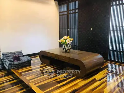 Elegant living room with unique wooden table and stylish flooring