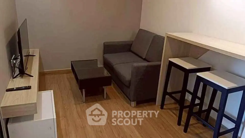 Cozy living room with modern furniture and wooden flooring