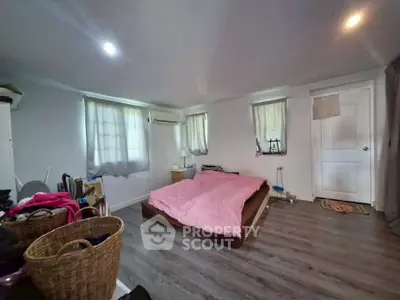 Cozy bedroom with minimalist decor and natural light