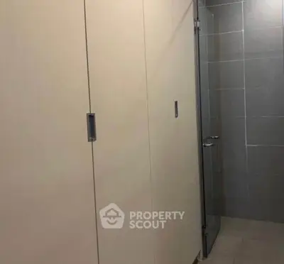 Modern bathroom with sleek glass shower and minimalist design