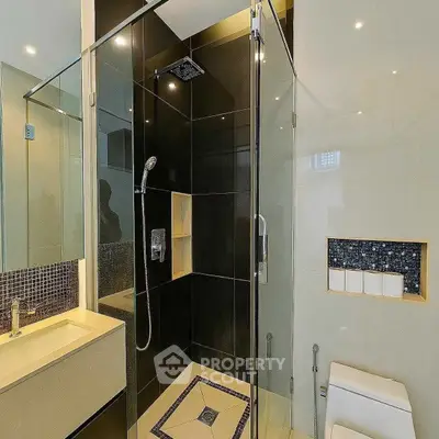 Modern bathroom with glass shower and sleek design