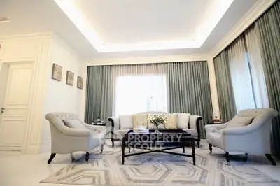 Elegant living room with plush seating and modern decor