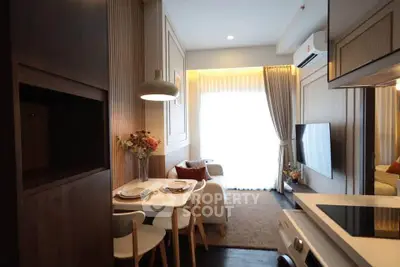 Cozy modern living room with dining area and natural light