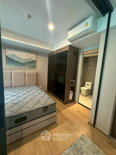 Modern bedroom with ensuite bathroom and stylish decor