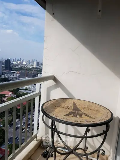 Charming balcony with city view, perfect for relaxation and enjoying the skyline.