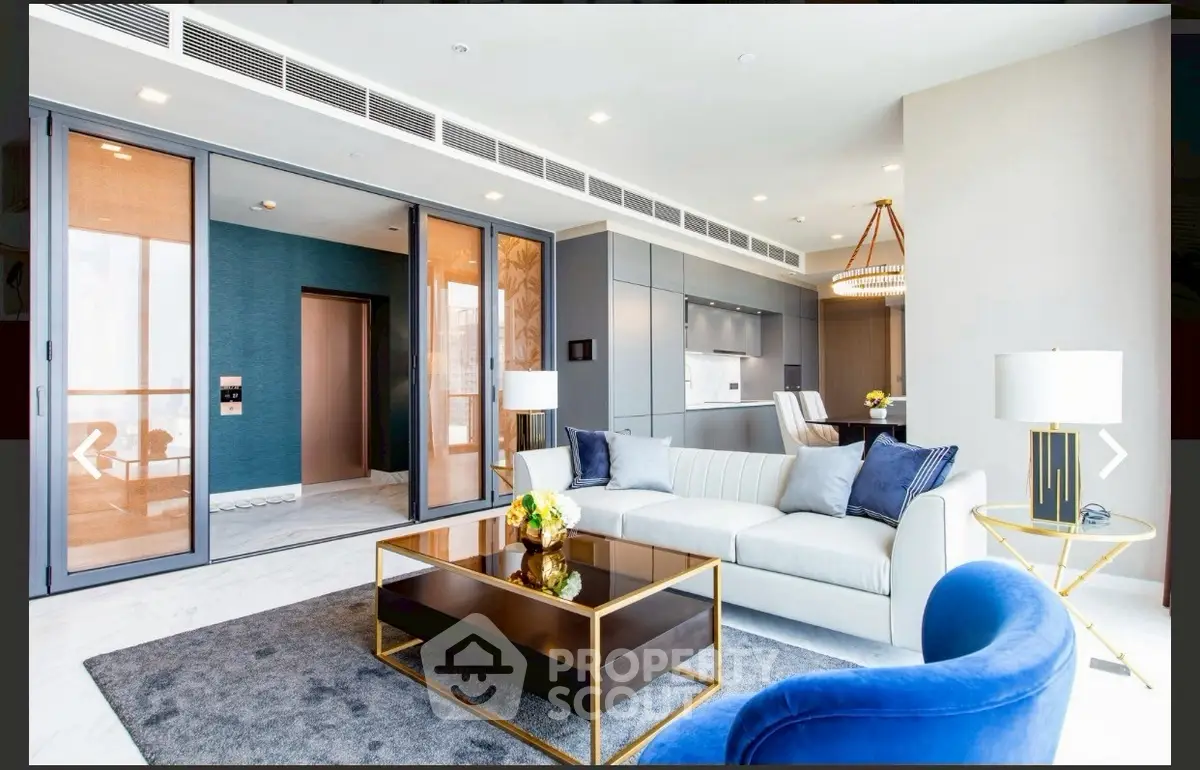 Luxurious modern living room with elegant decor and open kitchen layout