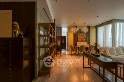 Luxurious living room with elegant decor and chandelier lighting