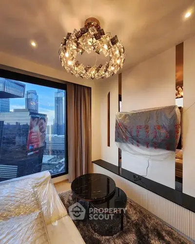 Luxurious living room with stunning city view and elegant chandelier