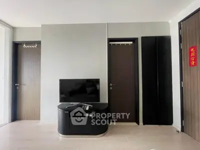 Modern living room with sleek TV stand and minimalist decor