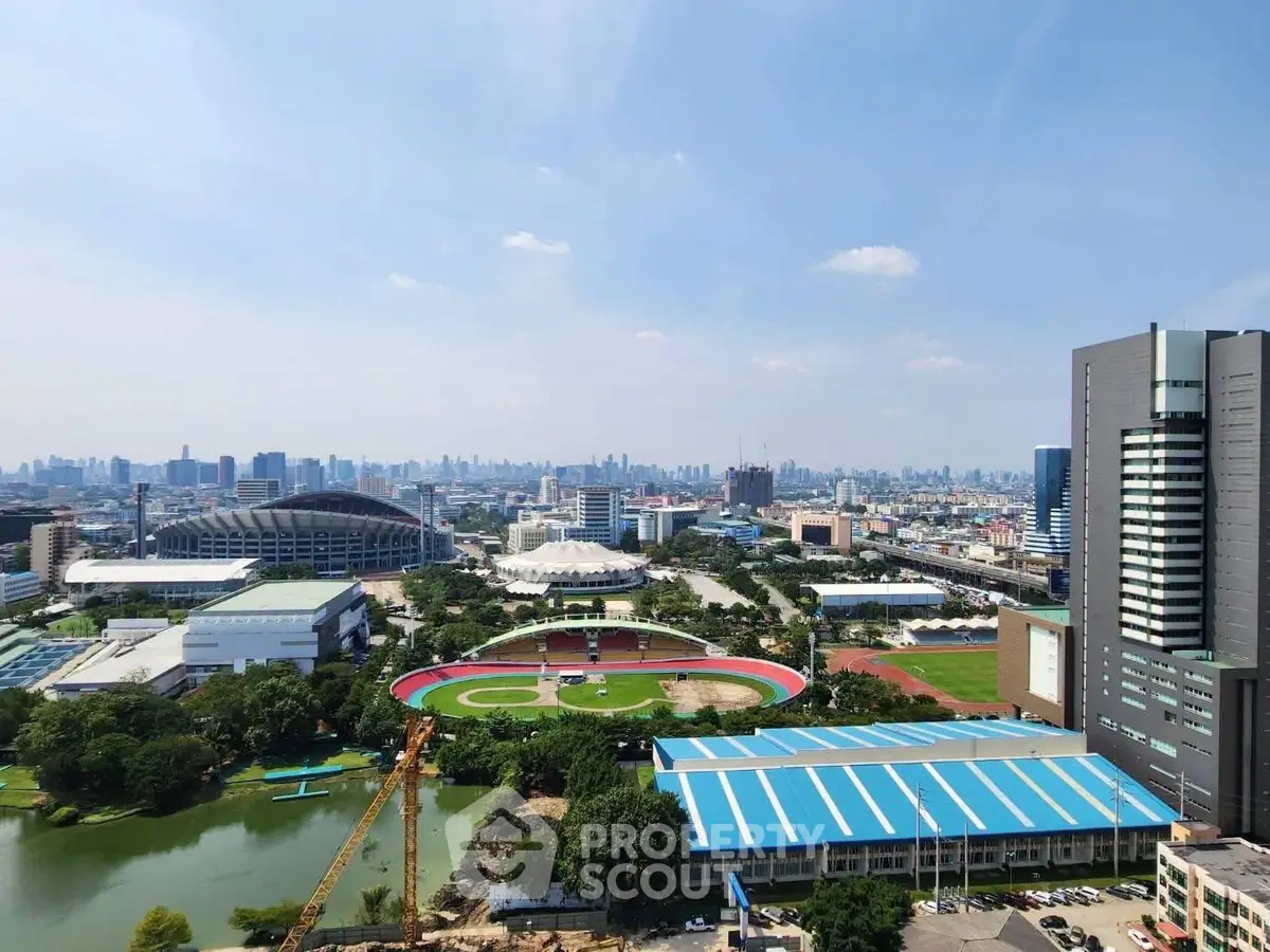 Stunning cityscape view with modern buildings and lush greenery, perfect for urban living enthusiasts.