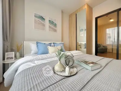 Modern bedroom with cozy decor and stylish furnishings in a contemporary apartment.