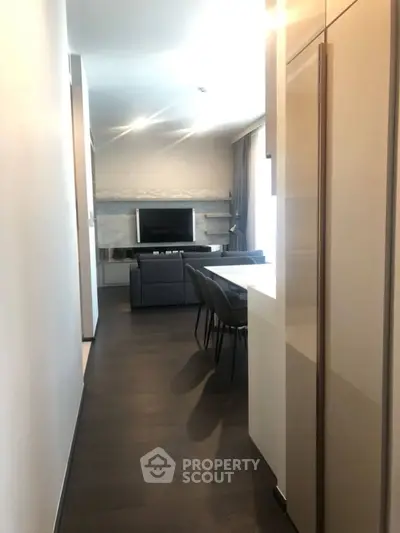 Modern living room with sleek furniture and open layout