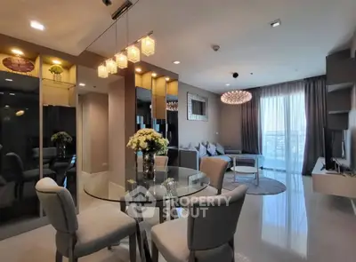 Luxurious modern living room with elegant dining area and stylish lighting.