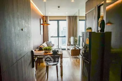Modern living room with city view, stylish decor, and cozy dining area