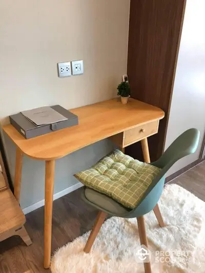 Cozy study nook with modern desk and chair in stylish apartment