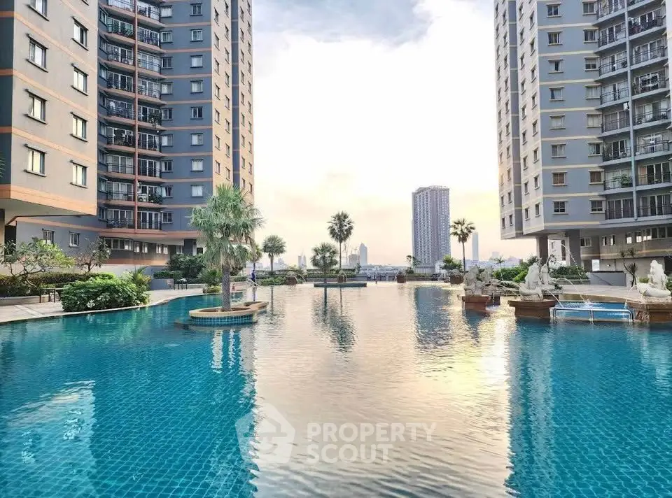 Luxurious residential complex with stunning pool and skyline view