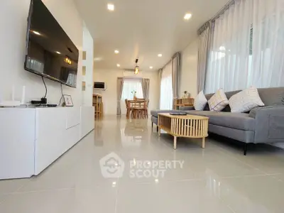 Spacious modern living room with sleek design and natural light