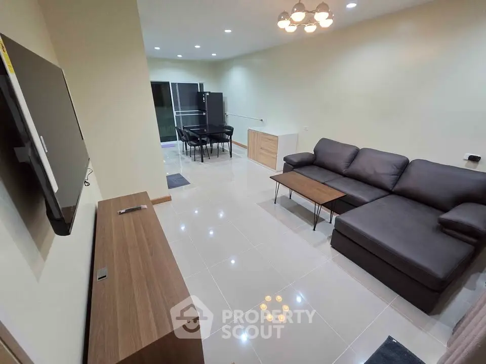 Modern living room with sleek furniture and open layout, perfect for contemporary living.
