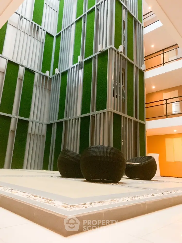 Modern building interior with unique architectural design and stylish seating area