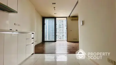 Spacious modern apartment with open layout and city view balcony