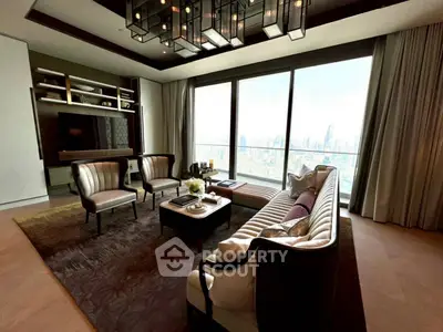 Luxurious living room with panoramic city view and elegant furnishings.