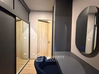 Modern study area with sleek desk and mirror in stylish apartment