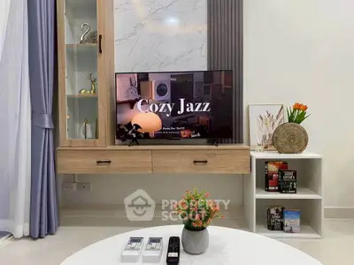 Modern living room with stylish TV setup and elegant decor