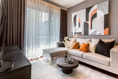 Stylish modern living room with chic decor and large window view