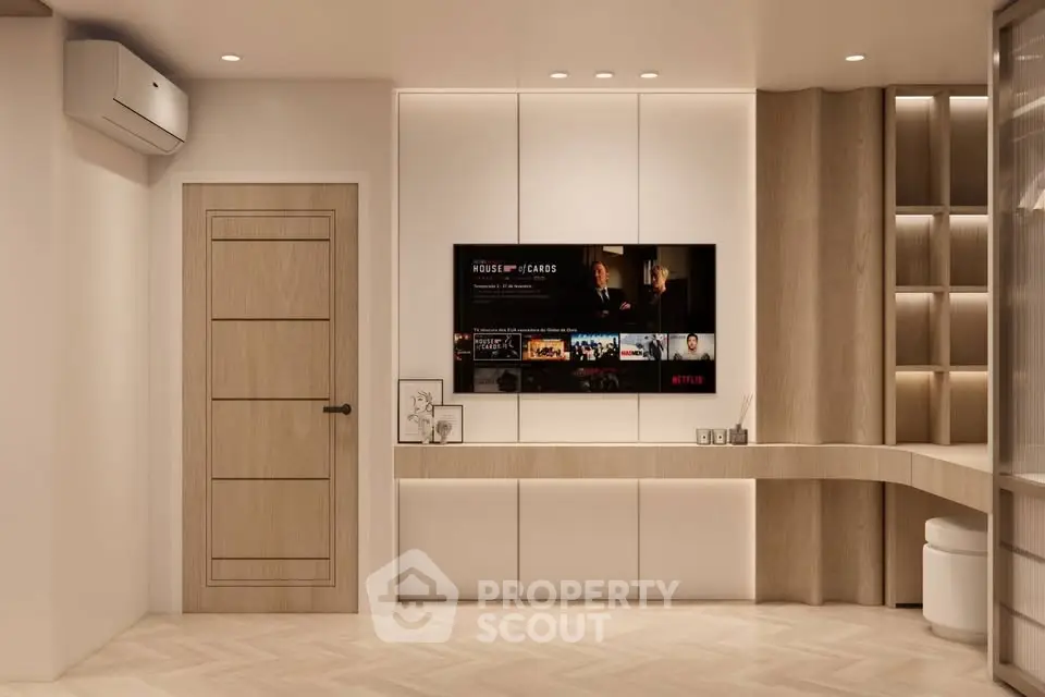 Modern living room with built-in TV unit and stylish lighting